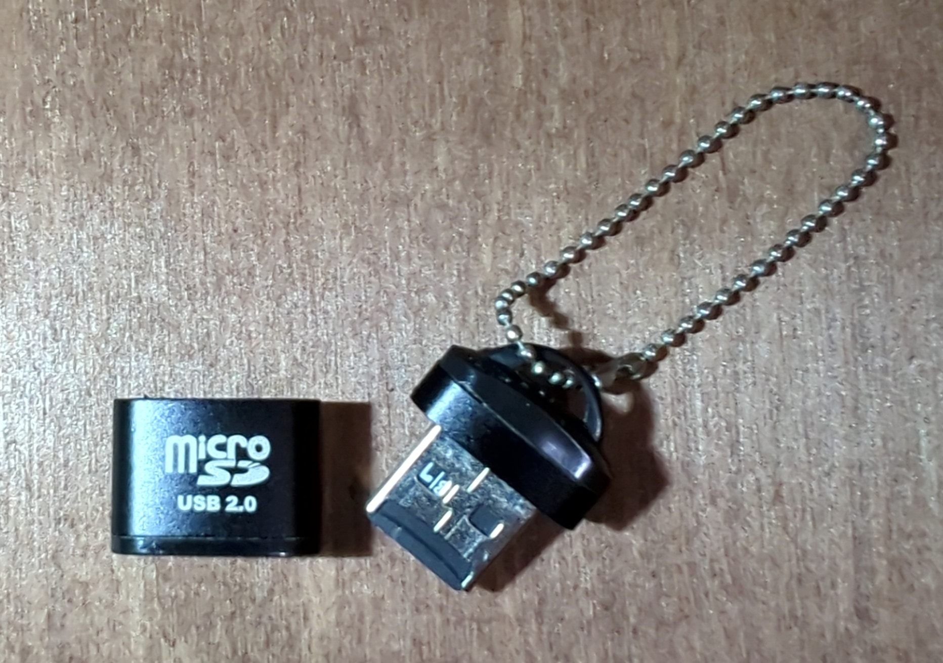 Micro-SD to USB-A adapter.